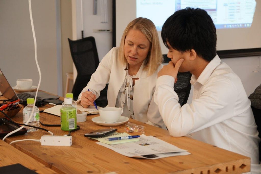 Rachel Le Vely brainstorms with a Honda employee